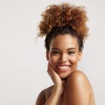 closeup portrait of a black woman with ideal skin