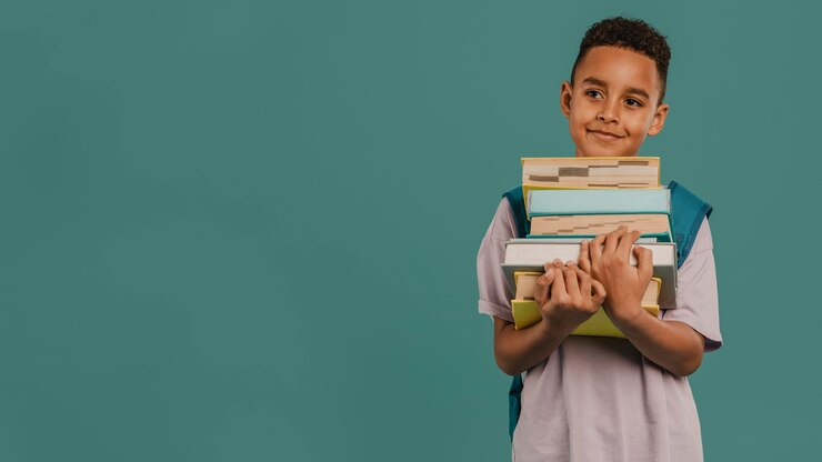 front-view-child-holding-pile-books-copy-space-23-2148764071