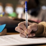 Team of college students working on a project related to business management