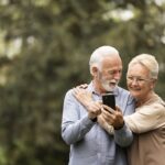 medium-shot-senior-couple-taking-selfie